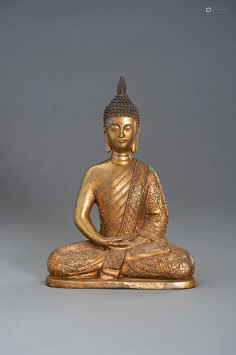 A GILT BRONZE BUDDHA