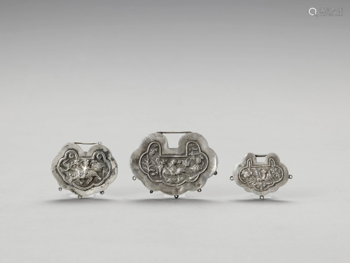 THREE SILVER LOCK CHARMS, LATE QING