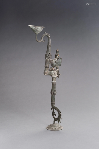 AN UNUSUAL BRONZE OIL LAMP