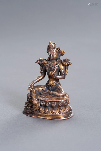 A GILT COPPER ALLOY FIGURE OF WHITE TARA