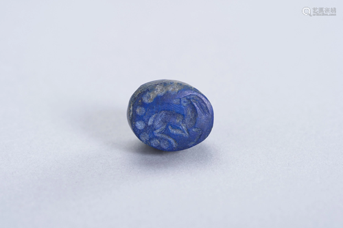 A LAPIS LAZULI 'ANTELOPE' INTAGLIO SEAL