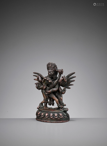 A SILVER-INLAID BRONZE FIGURE OF HERUKA & CONSORT