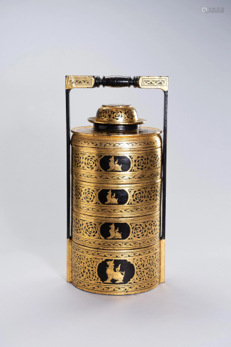 A LARGE DRY LACQUER TIFFIN CARRIER