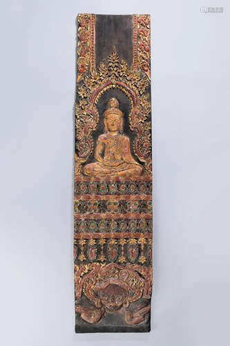 A LARGE CARVED WOOD PANEL DEPICTING BUDDHA