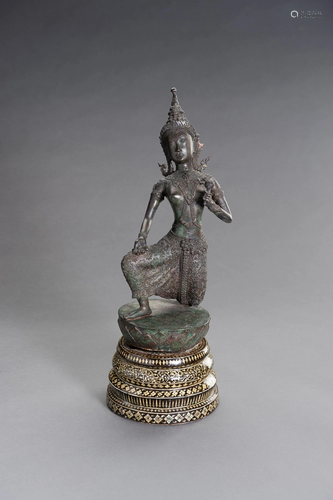 A BRONZE FIGURE OF A DANCING APSARA