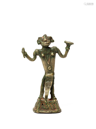 A BASTAR BRONZE GODDESS WITH APRON AND KHAPPAR