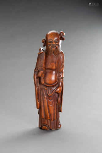 A CARVED BAMBOO FIGURE OF AN IMMORTAL