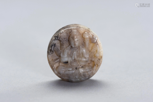 AN AVALOKITESHVARA CELADON JADE PENDANT