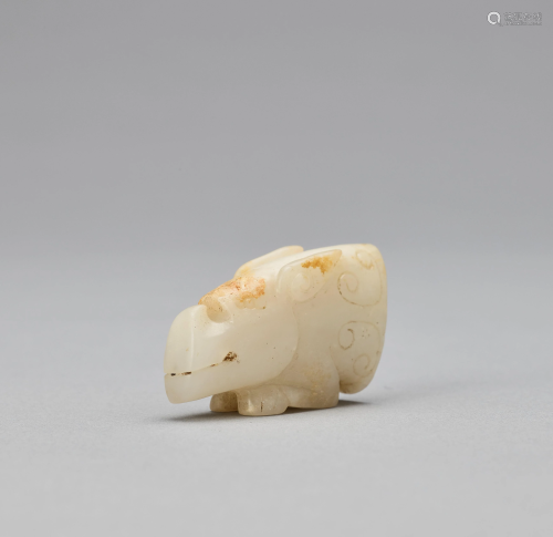 ARCHAISTIC WHITE JADE MYTHICAL BEAST HEAD, QING