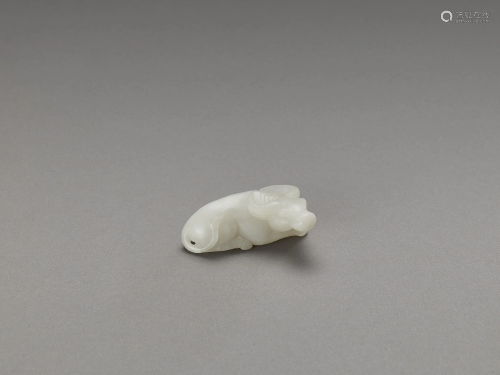 AN EXQUSITE WHITE JADE 'OX' MINIATURE CARVING