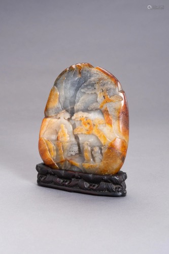 A GRAY AND RUSSET JADE BOULDER WITH IMMORTALS