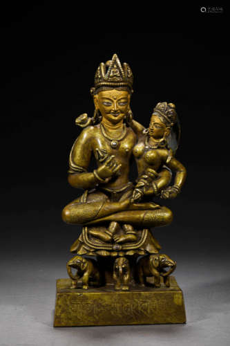 A GILT BRONZE  BUDDHA STATUE