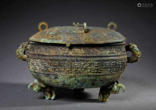 A BRONZE TRIPOT DING VESSEL