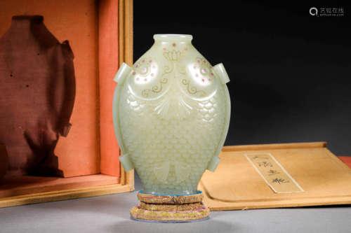 A VINTAGE HETIAN JADE FISH SHAPED VASE