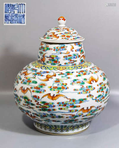 A DOU CAI GLAZED PORCELAIN LIDDED ZUN VASE