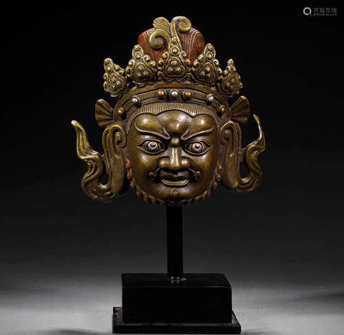 A GILT BRONZE  BUDDHA HEAD STATUE