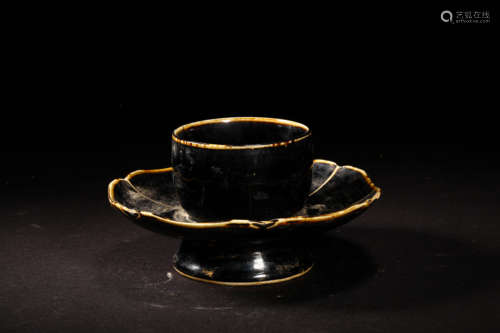 A BLACK GLAZED PORCELAIN TEA CUP