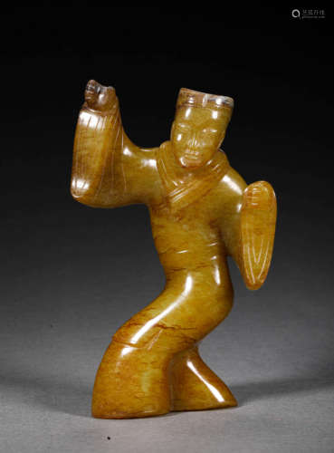 A ARCHAEOLOGICAL HETIAN JADE FIGURINE