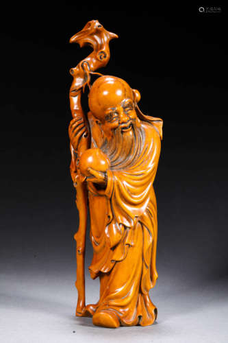 A HUANGYANG WOOD STATUE