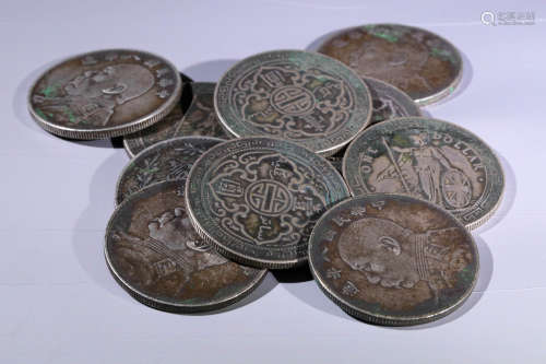 A SET OF VINTAGE SILVER COINS
