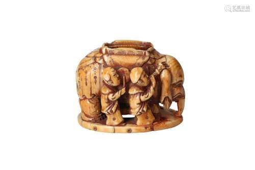 An ivory netsuke-okimono depicting an Indian elephant with f...