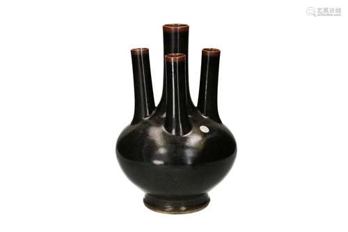 A dark brown speckled glazed porcelain tulip vase with five ...