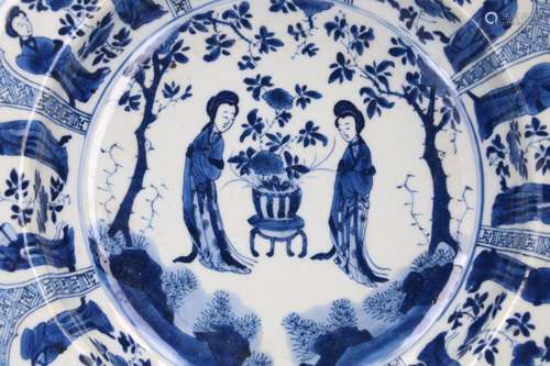 A blue and white porcelain deep saucer, decorated with Long ...