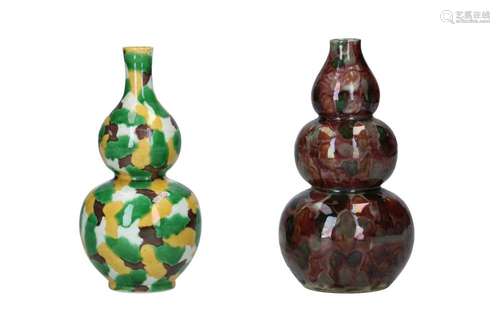 Two polychrome porcelain vases, one with spinach-and-egg dec...