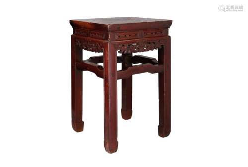 A rosewood table with probably Huanghuali panels. China, 19t...