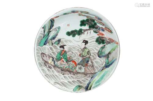 A famille verte porcelain deep saucer, decorated with two wo...