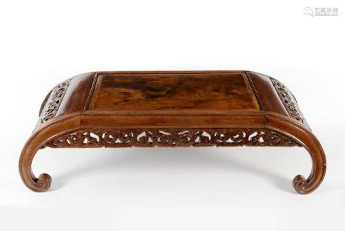 A wooden coffee table. China, 19th/20th century. H
