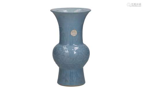 A clair de lune porcelain yen yen vase with a floral decorat...