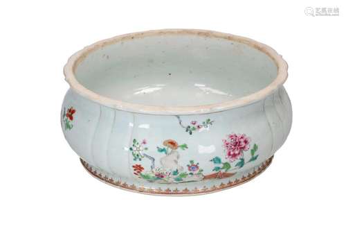 A famille rose porcelain tureen with a floral decoration. Un...