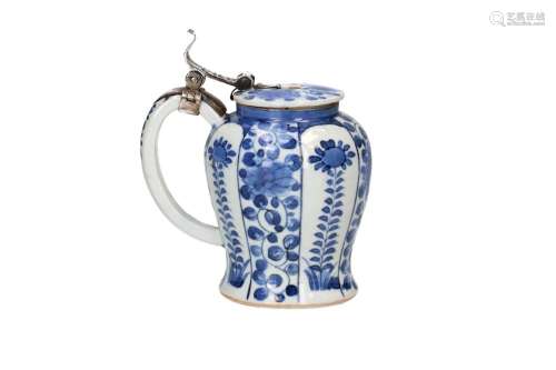 A blue and white porcelain mustard jar with silver mounting,...