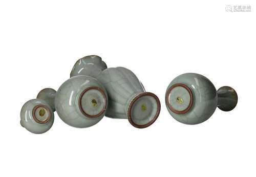 Lot of four, grey crackle glazed porcelain vases in differen...