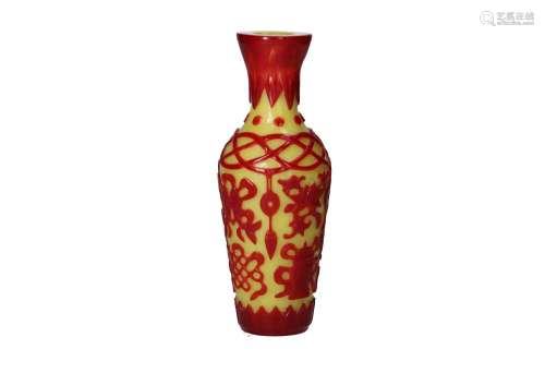A red on yellow glass baluster vase, with bajixiang decorati...