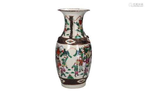 A pair of polychrome porcelain vases, decorated with a battl...