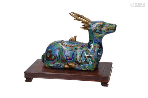 An enamel cloisonné censer in the shape of a recumbent deer ...