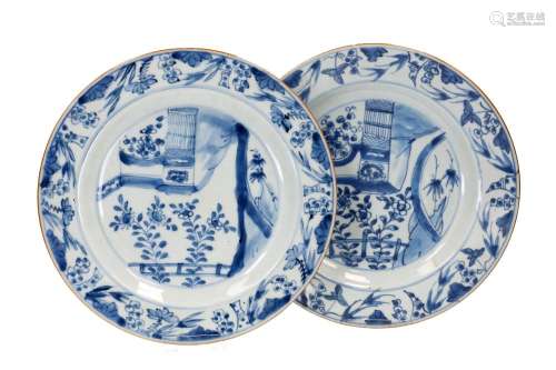 A set of six blue and white porcelain dishes, decorated with...
