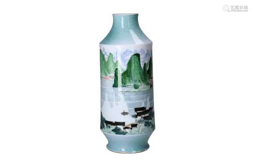 A polychrome porcelain vase decorated with a mountainous riv...