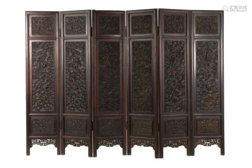 A six-fold red wooden room divider, decorated with dragons. ...