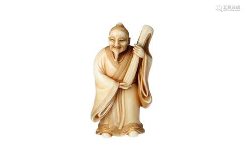 An ivory netsuke depicting an old man standing with a goatee...