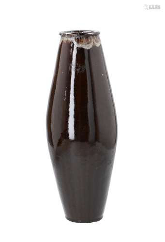 An olive shaped black glazed porcelain vase. Marked with 4-c...