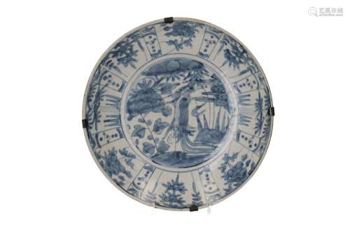 A blue and white porcelain deep charger, decorated with flow...