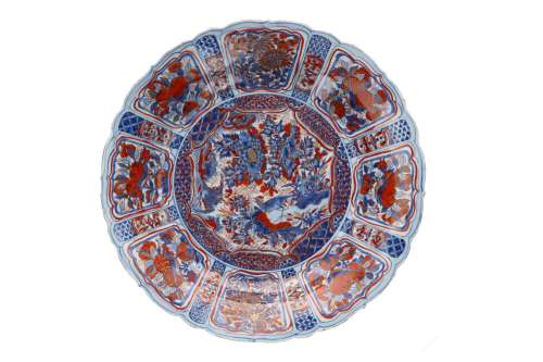 A blue and overglaze red porcelain deep charger with scallop...