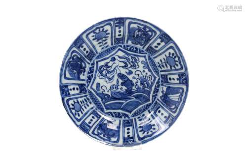 A blue and white 'kraak' porcelain dish with a scalloped rim...