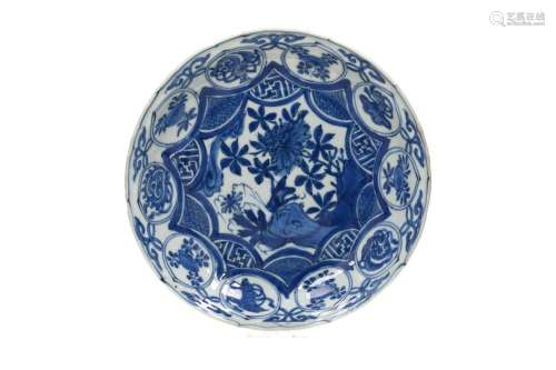 A blue and white 'kraak' porcelain dish with a scalloped rim...