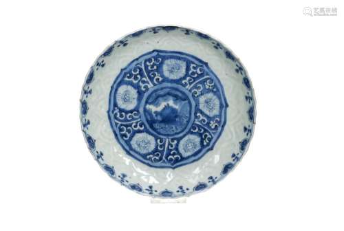 A blue and white 'kraak' porcelain dish with a scalloped rim...