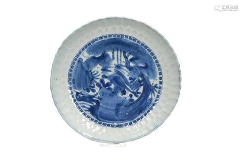 A blue and white 'kraak' porcelain dish with a scalloped rim...