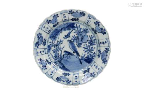 A blue and white 'kraak' porcelain dish with a scalloped rim...